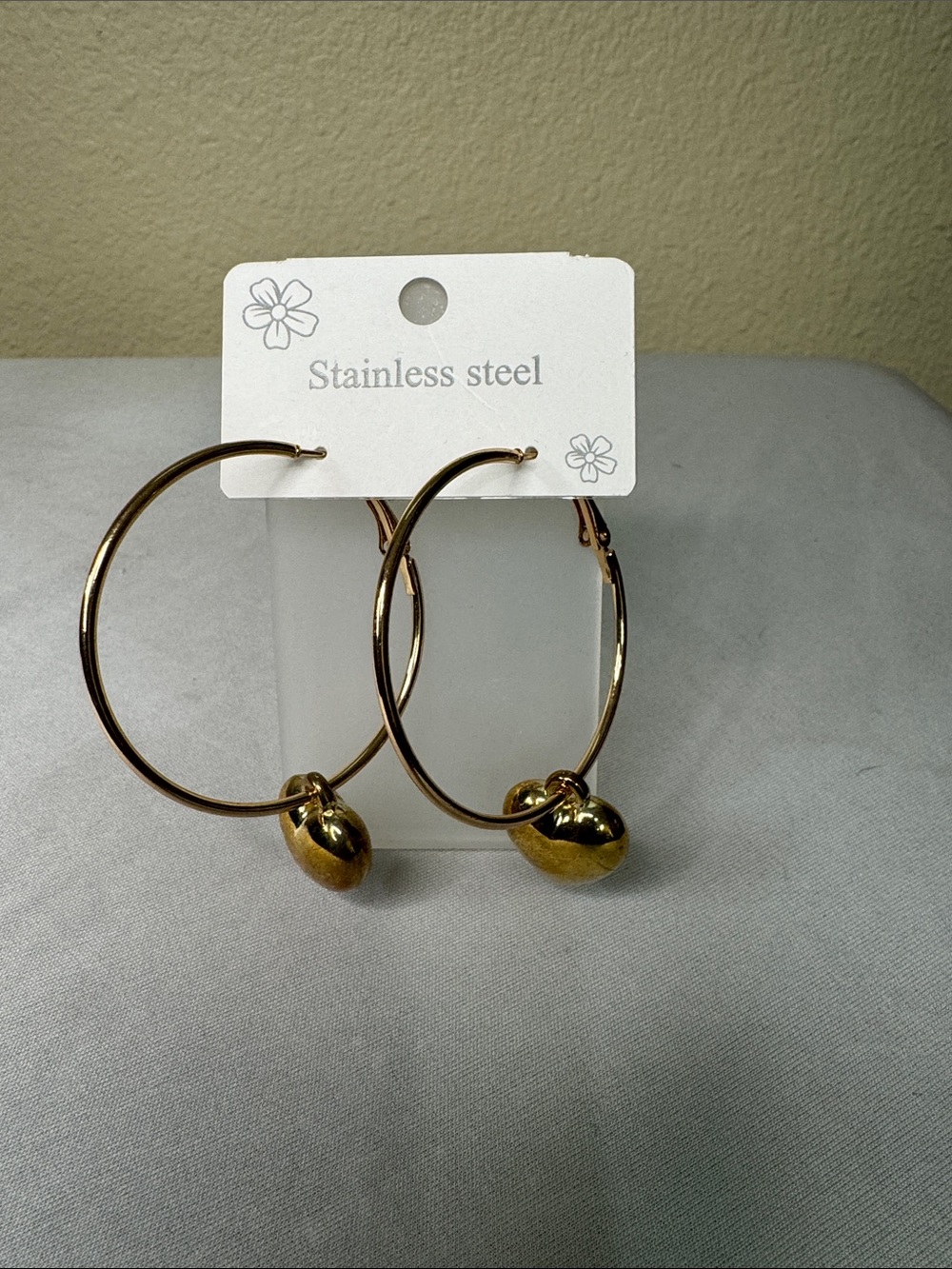 Gold Stainless Steel Hoop Earrings with Gold Heart Charms
